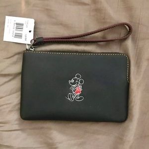 NWT Mickey Mouse Coach wristlet.